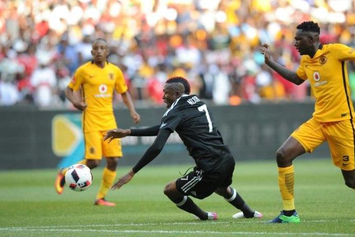 Tendai Ndoro of Orlando Pirates (L) vies with Erick Mathoho of Kaiser Chiefs during their derby football match on October 29, 2016 at the FNB Stadium in Johannesburg