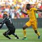 Tendai Ndoro of Orlando Pirates (L) vies with Erick Mathoho of Kaiser Chiefs during their derby football match on October 29, 2016 at the FNB Stadium in Johannesburg