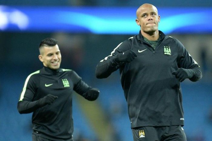 Manchester City's Sergio Aguero (left) and Vincent Kompany warm up ahead of a Champions League match against Dynamo Kiev in March 2016