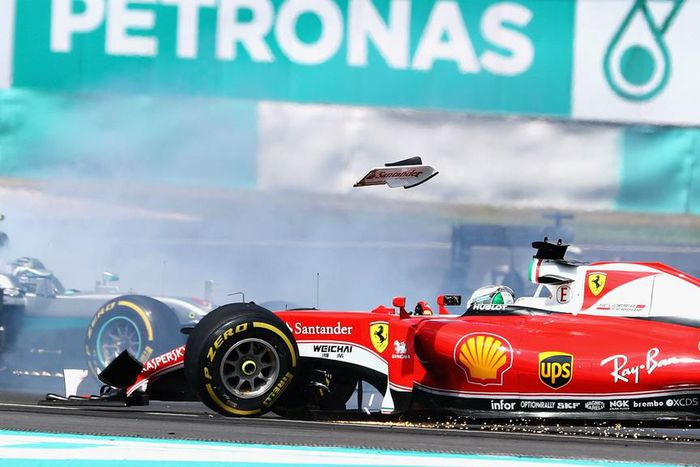 ___5557564___https:______static.pulse.com.gh___webservice___escenic___binary___5557564___2016___10___2___18___vettelcrash-cropped_1u7hvov5atxwi1rv6vdjz5vmvh