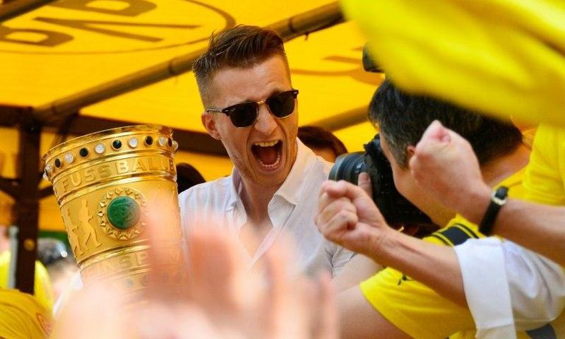 Dortmund's forward Marco Reus celebrates after Borussia Dortmund's German Cup victory over Eintracht Frankfurt