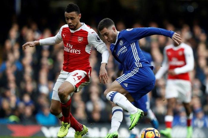 Chelsea's Eden Hazard (right) cuts past Arsenal's Francis Coquelin during their English Premier League match at Stamford Bridge in London, on February 4, 2017