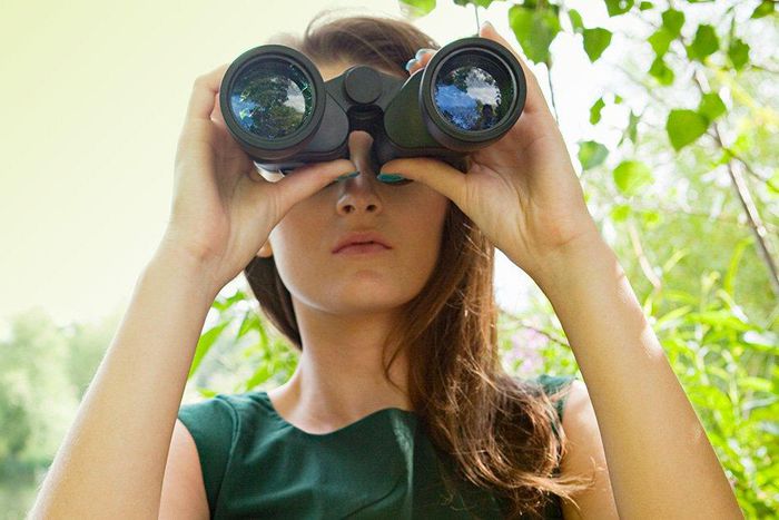 woman spying on partner