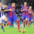 Real Sociedad's defender Yuri Berchiche (L) vies with Barcelona's Brazilian forward Neymar da Silva Santos Junior during the Spanish league football match Real Sociedad vs FC Barcelona at the Anoeta stadium in San Sebastian, on November 27, 2016
