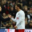 Southampton's manager Claude Puel shakes hands with striker Manolo Gabbiadini during their English League Cup final match against Manchester United, at Wembley stadium in London, on February 26, 2017
