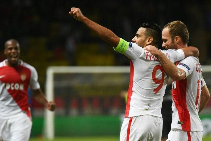 Monaco's Valere Germain (R) celebrates with teammate Radamel Falcao after scoring a goal during their UEFA Champions League Group E match against CSKA Moscow, at the Louis II Stadium in Monaco, on November 2, 2016