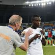 Ivory Coast's coach Michel Dussuyer (L) speaks to defender Eric Bailly ahead of the team's Africa Cup of Nations match against Morocco on January 24, 2017