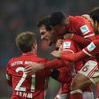 Bayern Munich's defender Mats Hummels (2nd L) celebrates scoring with his teammates during the German first division Bundesliga football match against Bayer 04 Leverkusen November 26, 2016
