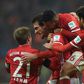 Bayern Munich's defender Mats Hummels (2nd L) celebrates scoring with his teammates during the German first division Bundesliga football match against Bayer 04 Leverkusen November 26, 2016