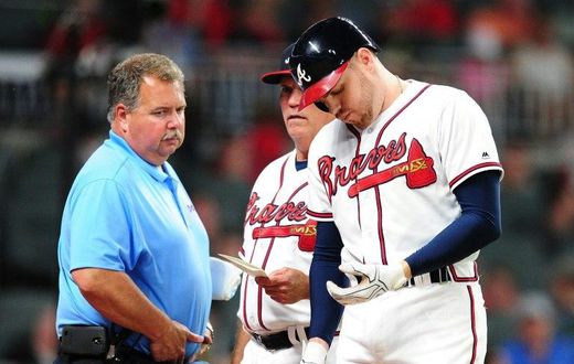 Freddie Freeman #5 of the Atlanta Braves sustained the second major wrist injury of his career after he was hit by a fastball from Toronto Blue Jays left-handed pitcher Aaron Loup on May 17, 2017