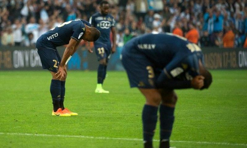 Bastia's players react at the final whistle of the French L1 football match between Marseille and Bastia on May 20, 2017, at the Velodrome stadium in Marseille, southern France