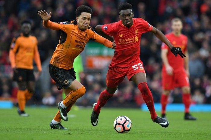 Wolverhampton Wanderers striker Helder Costa (left) vies with Liverpool's English midfielder Ovie Ejaria during their English FA Cup match at Anfield in Liverpool on January 28, 2017
