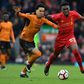 Wolverhampton Wanderers striker Helder Costa (left) vies with Liverpool's English midfielder Ovie Ejaria during their English FA Cup match at Anfield in Liverpool on January 28, 2017