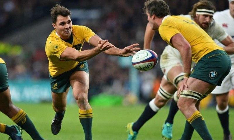 Australia's scrum-half Nick Phipps passes the ball during a rugby union Test match against England, at Twickenham stadium in London, in December 2016