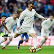 Real Madrid's Portuguese forward Cristiano Ronaldo plays against Real Sporting de Gijon at the Santiago Bernabeu stadium in Madrid on November 26, 2016