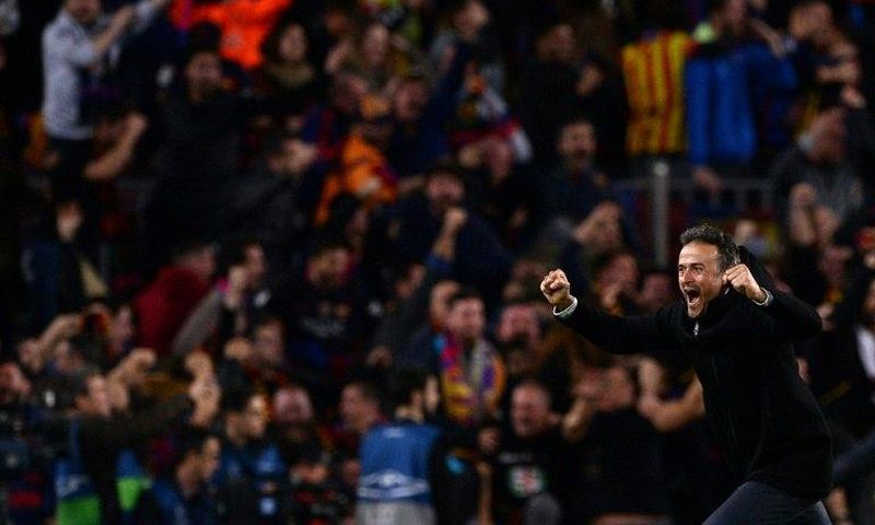 Barcelona coach Luis Enrique celebrates their 6-1 second leg victory over Paris Saint-Germain in their last 16 Champions League tie at the Nou Camp stadium on March 8, 2017