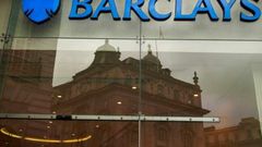 Barclays reported annual net profit of £1.62 billion compared with a loss after tax of £394 million in 2015