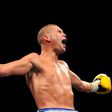 Britain's Tony Bellew retained his World Boxing Council cruiserweight title with a third-round stoppage of BJ Flores at the Echo Arena in Liverpool