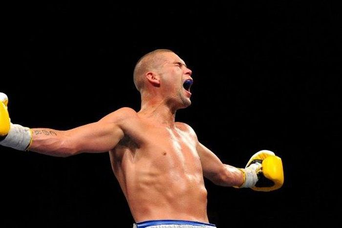 Britain's Tony Bellew retained his World Boxing Council cruiserweight title with a third-round stoppage of BJ Flores at the Echo Arena in Liverpool