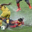 Mali's midfielder Yves Bissouma (L) challenges Uganda's defender Godfrey Walusimbi during the 2017 Africa Cup of Nations group D football match in Oyem on January 25, 2017