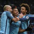 Manchester City's Brazilian striker Gabriel Jesus (C) celebrates with Pablo Zabaleta (L) and Leroy Sane (R) after scoring their late winning goal against Swansea City on February 5, 2017
