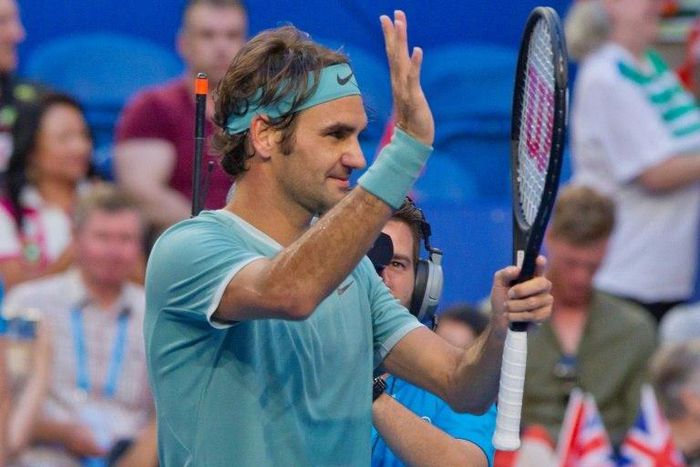 Roger Federer waves to spectators after defeating Dan Evans on day two of the Hopman Cup tennis tournament in Perth on January 2, 2017