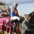Britain's Ryan-Lee Moore on his horse 'Found' celebrates winning the 95th Prix de l'Arc de Triomphe horse race at the Chantilly racecourse, northern France, on October 2, 2016
