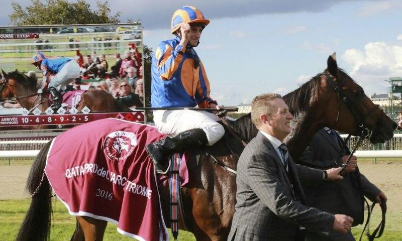Britain's Ryan-Lee Moore on his horse 'Found' celebrates winning the 95th Prix de l'Arc de Triomphe horse race at the Chantilly racecourse, northern France, on October 2, 2016