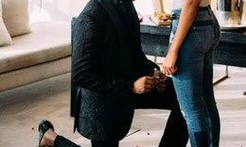 Banky W proposing to Adesua Etomi