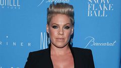 Pink shares a post of breastfeeding her son.