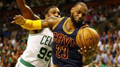 LeBron James of the Cleveland Cavaliers battles for the ball with Jae Crowder of the Boston Celtics in Game Two of the 2017 NBA Eastern Conference finals, at TD Garden in Boston, Massachusetts, on May 19