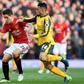 Manchester United's Spanish midfielder Ander Herrera (L) vies with Arsenal's French midfielder Francis Coquelin during the English Premier League football match between Manchester United and Arsenal on November 19, 2016