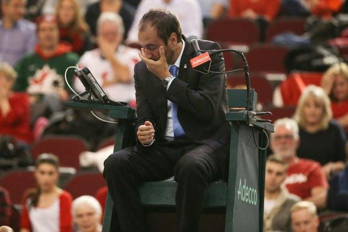 Tennis umpire Arnaud Gabas was taken to hospital after he was hit in the face with a ball hit by Denis Shapovalov during a Davis Cup tie between Canada and Great Britain in Ottawa