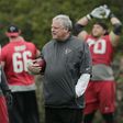Vic Beasley of the Atlanta Falcons talks with Defensive Coordinator Richard Smith during the Super Bowl LI practice on February 3, 2017 in Houston, Texas