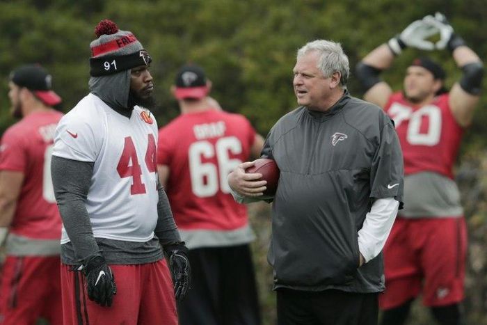 Vic Beasley of the Atlanta Falcons talks with Defensive Coordinator Richard Smith during the Super Bowl LI practice on February 3, 2017 in Houston, Texas
