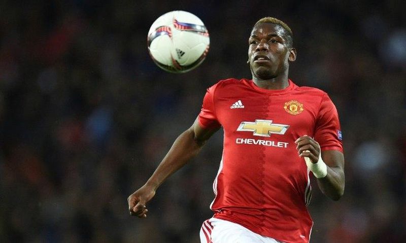 Manchester United's French midfielder Paul Pogba chases the ball during the UEFA Europa League quarter-final match between Manchester United and Anderlecht at Old Trafford in Manchester on April 20, 2017