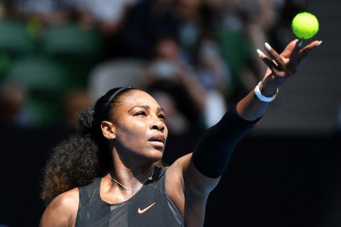 Serena Williams of the US serves against Czech Republic's Barbora Strycova during their Australian Open fourth round match, in Melbourne, on January 23, 2017