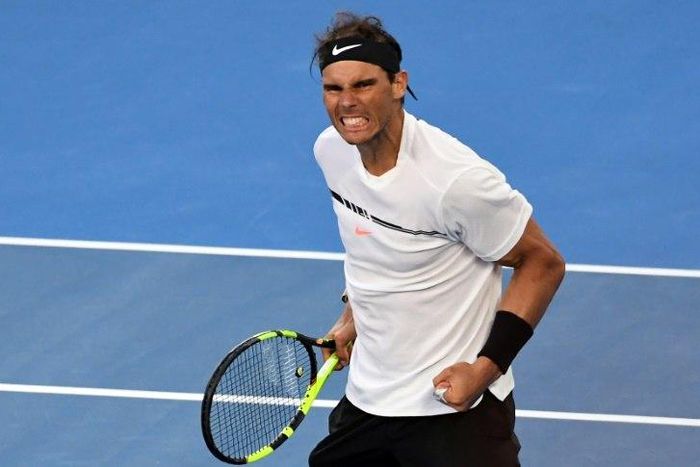 Spain's Rafael Nadal celebrates his victory over Russia's Alexander Zverev in their men's singles third round match on day six of the Australian Open tennis tournament in Melbourne on January 21, 2017