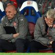 Arsenal fans subjected manager Arsene Wenger (R) to a stream of abuse and calls to resign as the team lost to Crystal Palace