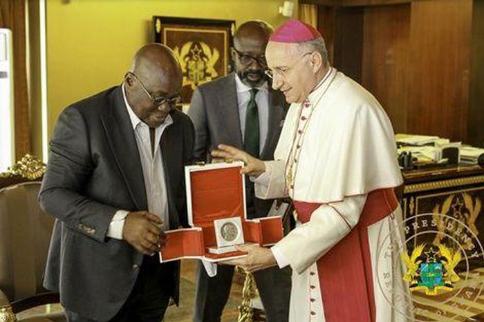 Nana Akufo-Addo with Archbishop Jean-Marie Speich