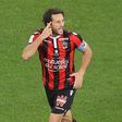 Nice's French defender and captain Paul Baysse celebrates after scoring a against Lyon on October 14, 2016