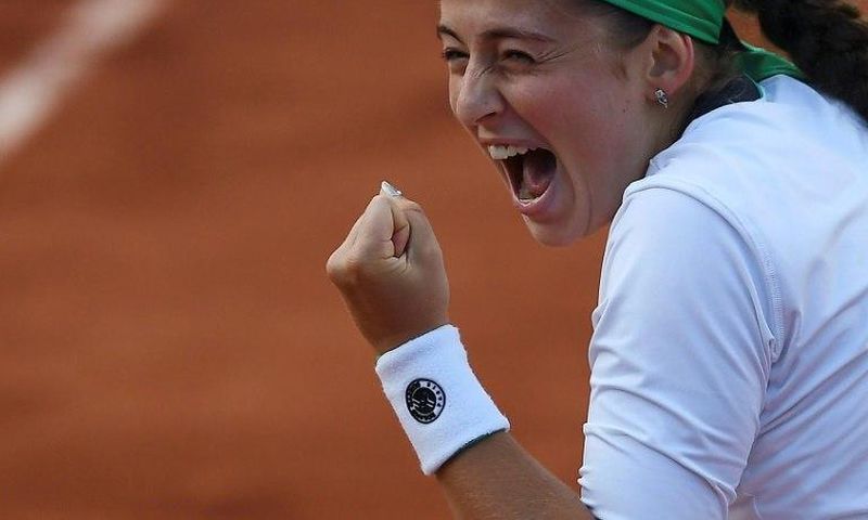 Latvia's Jelena Ostapenko reacts after winning her tennis match against Denmark's Caroline Wozniacki at the Roland Garros 2017 French Open on June 6, 2017 in Paris