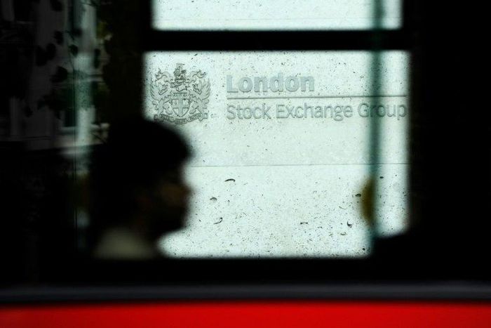London's benchmark FTSE 100 index of top blue-chip firms closed at a record high Decemeber 28, 2016