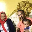 Sudanese family emigrating to the US, Mohamed al-Khatim (R), his wife Samah al-Amin (L) and their eight month old son are seen in Khartoum on February 10, 2017