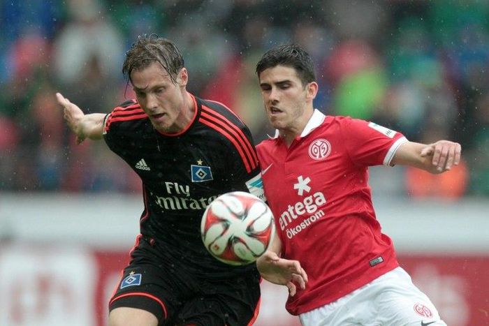 Mainz (red) and Hamburg (black), pictured in 2015, are both left on 34 points after Sunday's goalless draw, with Hamburg in the relegation play-off place due to their inferior goal difference