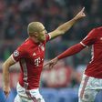 Bayern Munich's Arjen Robben (L) and Mats Hummels celebrate after scoring a goal during their UEFA Champions League round of 16 match against Arsenal, in Munich, on February 15, 2017