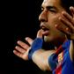 Barcelona's Luis Suarez reacts to a decision of the referee during their Spanish Copa del Rey semi final match against Atletico de Madrid at the Camp Nou stadium in Barcelona on February 7, 2017