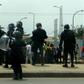 A probe into a stampede that killed at least 17 fans at a football match has blamed security measures and crowd control