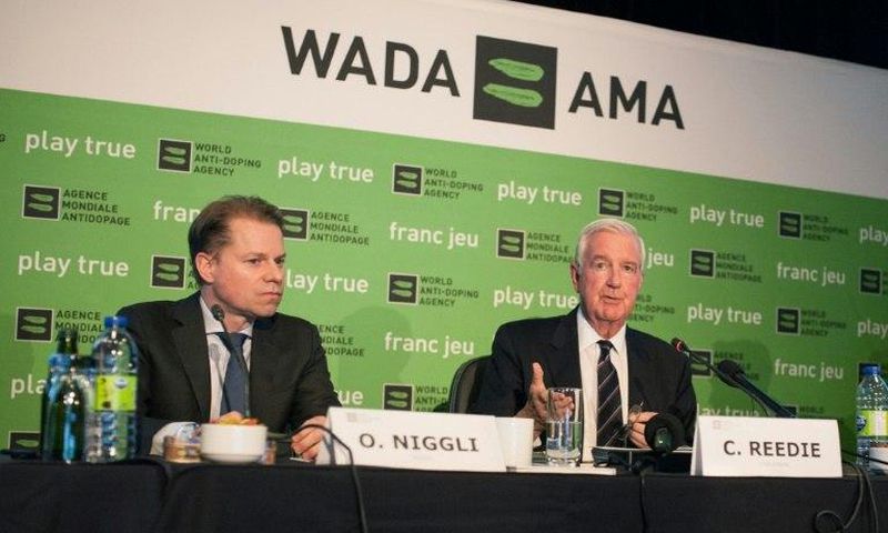 The World Anti-Doping Agency (WADA) President Craig Reedie (R) and Director General Olivier Niggli (L) speak at a press conference in Montreal on May 18, 2017