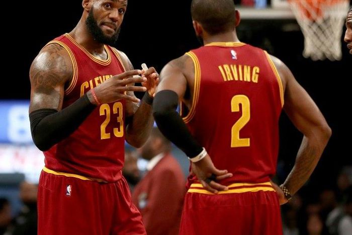 LeBron James and Kyrie Irving lead the Cleveland Cavaliers to a 140-135 win over the Washington Wizards in an NBA thriller